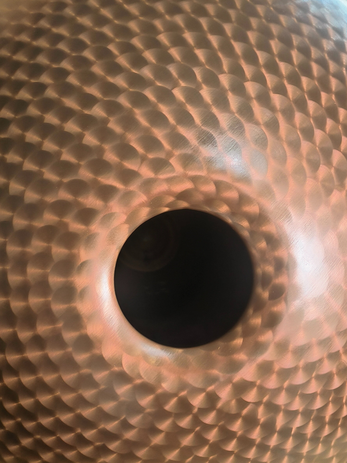 Close up of the Copper Engraved Fossey handpan