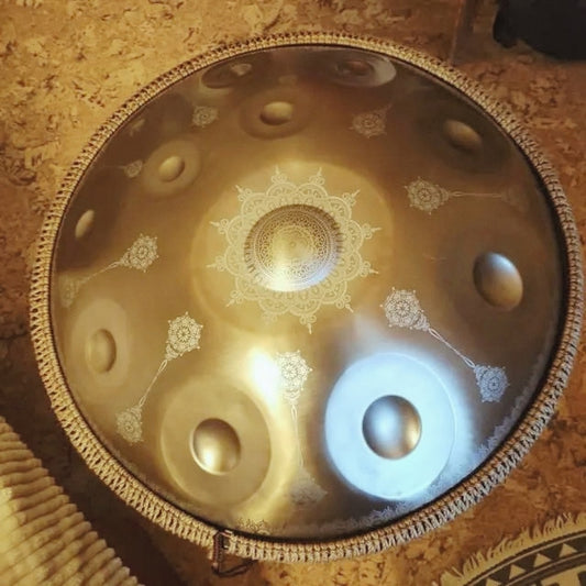 Gold Yantra handpan with mandala engravings viewed from above