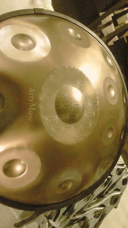Handpan with Flower of Life engraving and custom lettering around its central tone field. Inscribed Personalised 12-notes Fossey Handpan D Kurd 440Hz - 22' Stainless Steel, Hand-Tuned